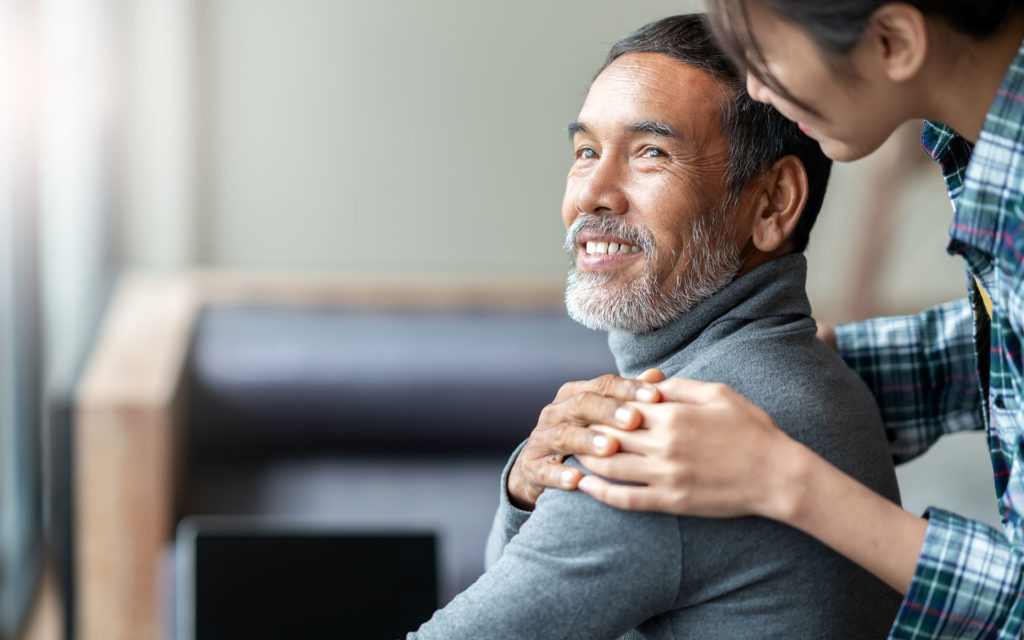 Daughter Embracing Father