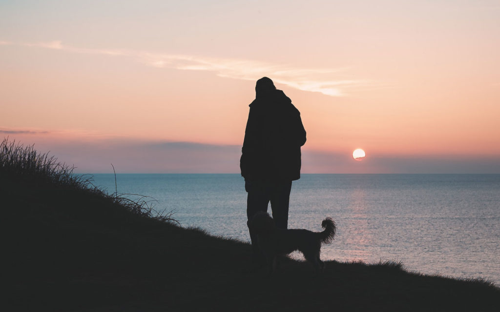 Man with Dog at the Coast